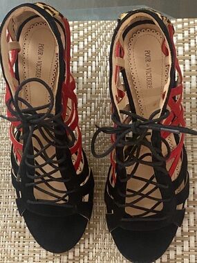 Pour La Victoire Black and Red Lace-Up Strappy Heels with animal print.